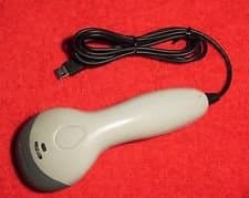 Metrologic Voyager MS9520-single line, 1-D handheld barcode scanner-USB, Beige, good condition, preowned, without stand, auto trigger, flash ROM, barcode data edit, easy programming, (without CodeGate tech). MS9540