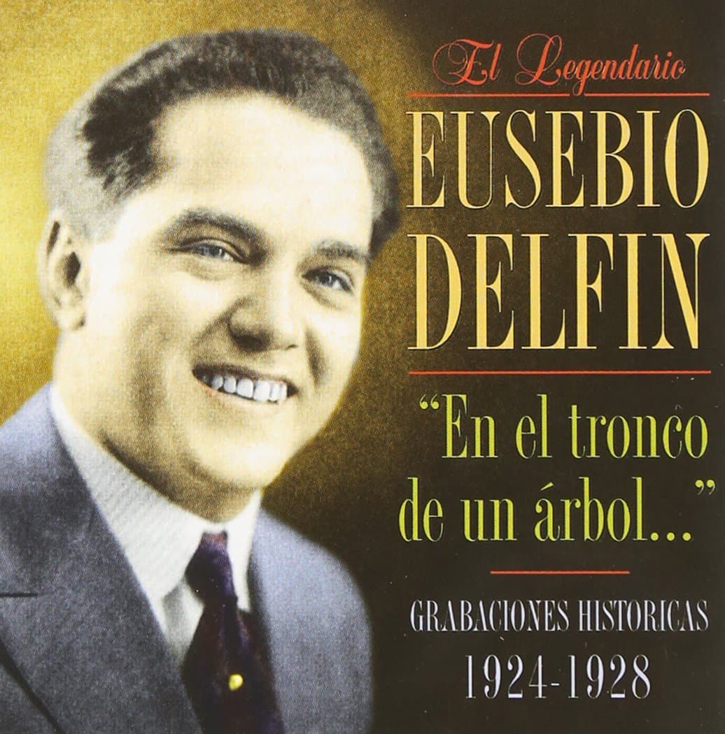 Eusebio DelfinEn El Tronco de Un Arbol
