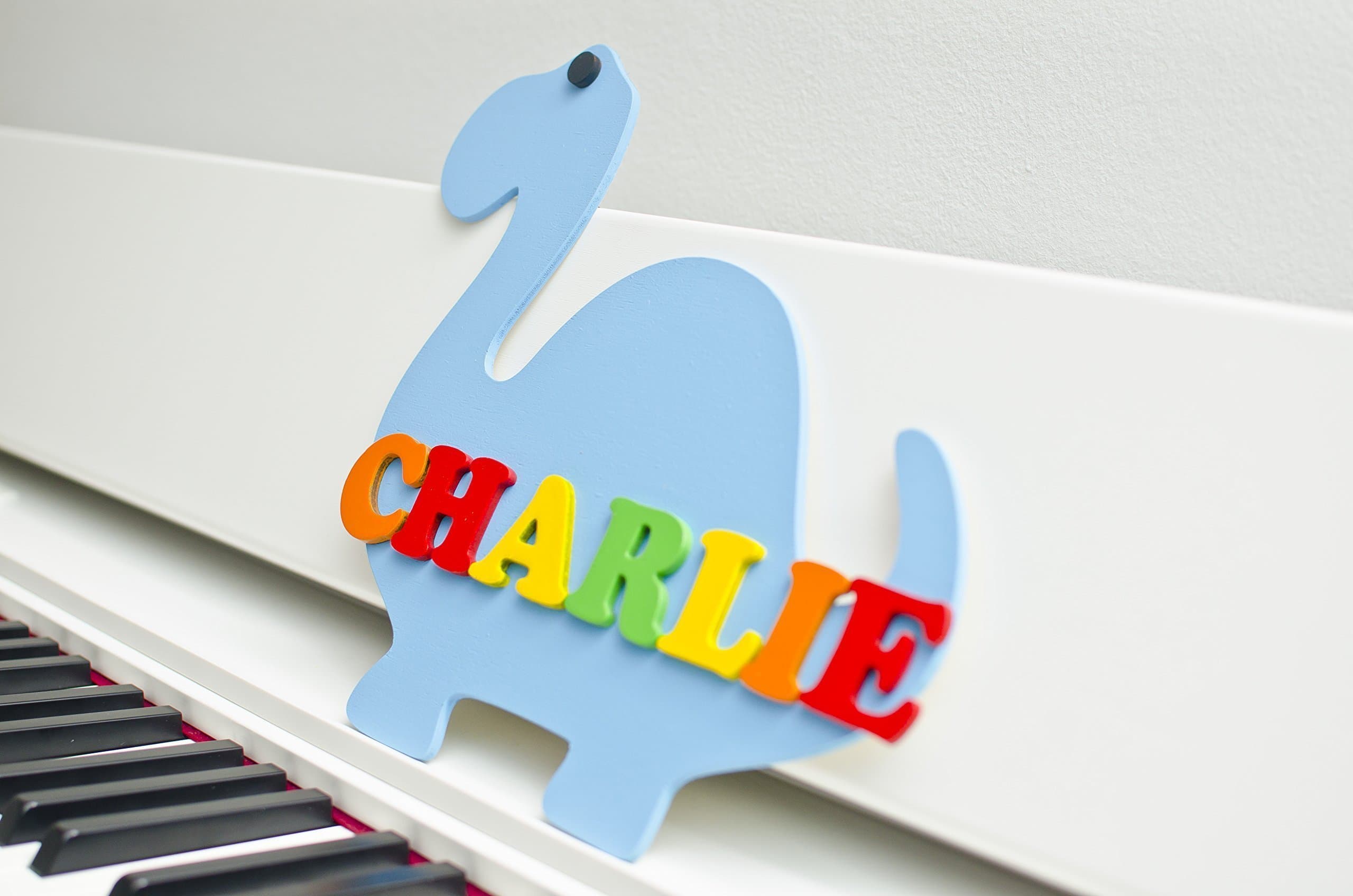 Personalized Dinosaur Shaped Nursery Name Wall Sign Plate